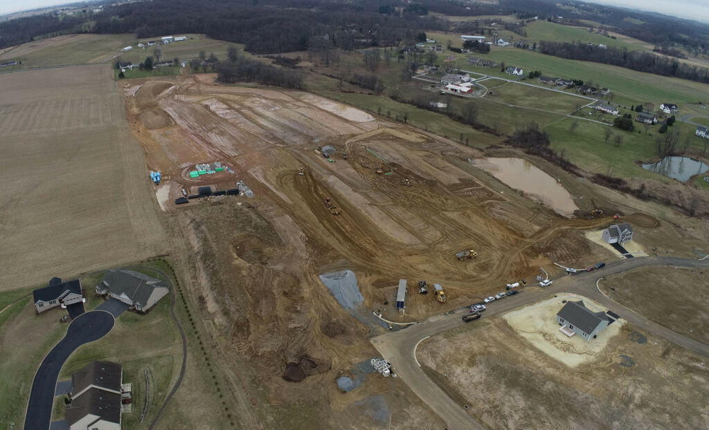 Aerial view of Creekside homes land, excavated by CH+N