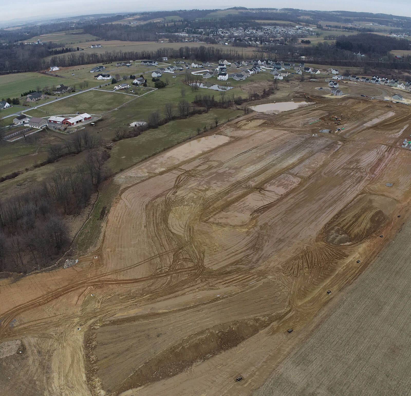 Aerial view of Creekside homes land, excavated by CH+N