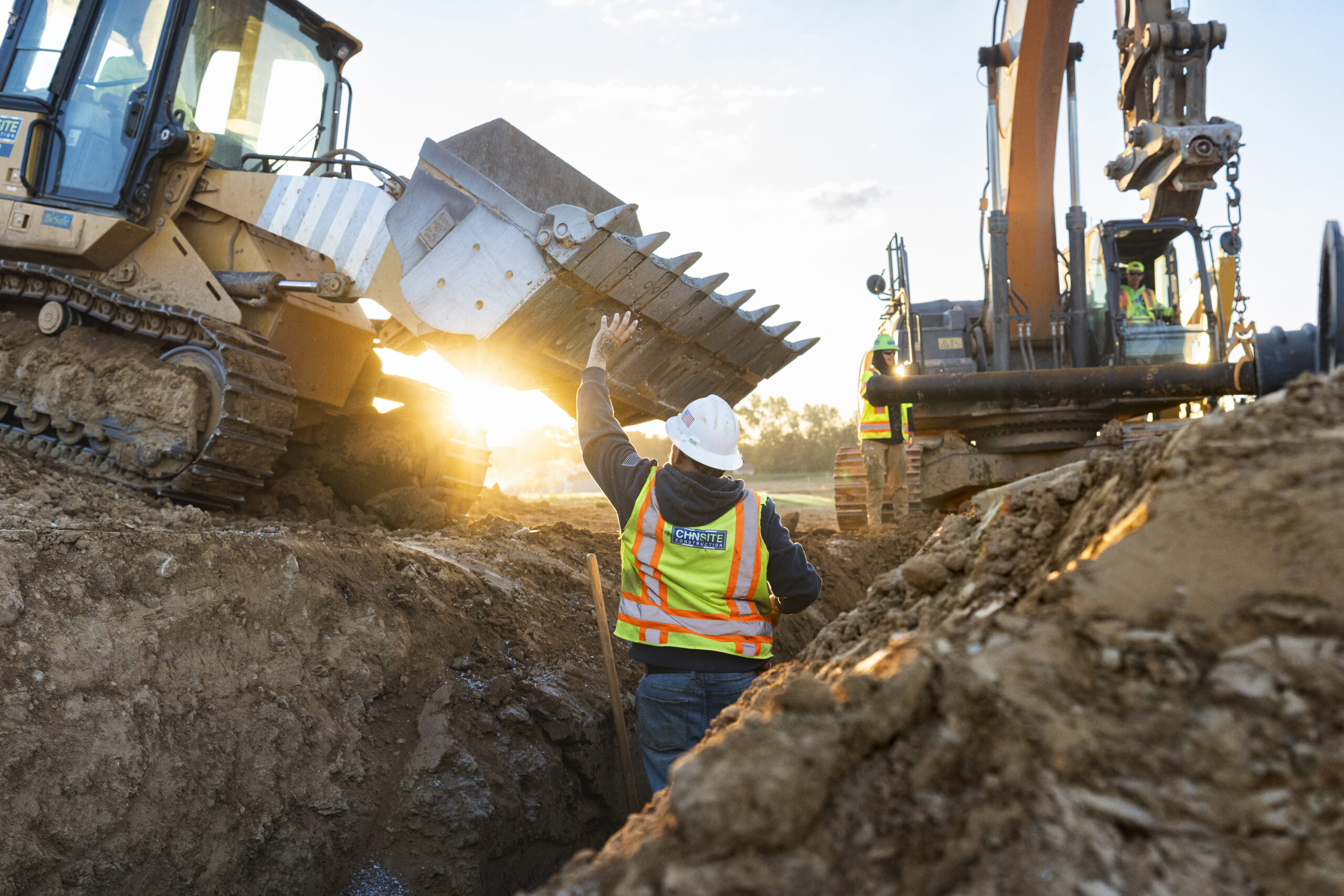 Construction Worker directing waterline utility in Elizabethtown PA